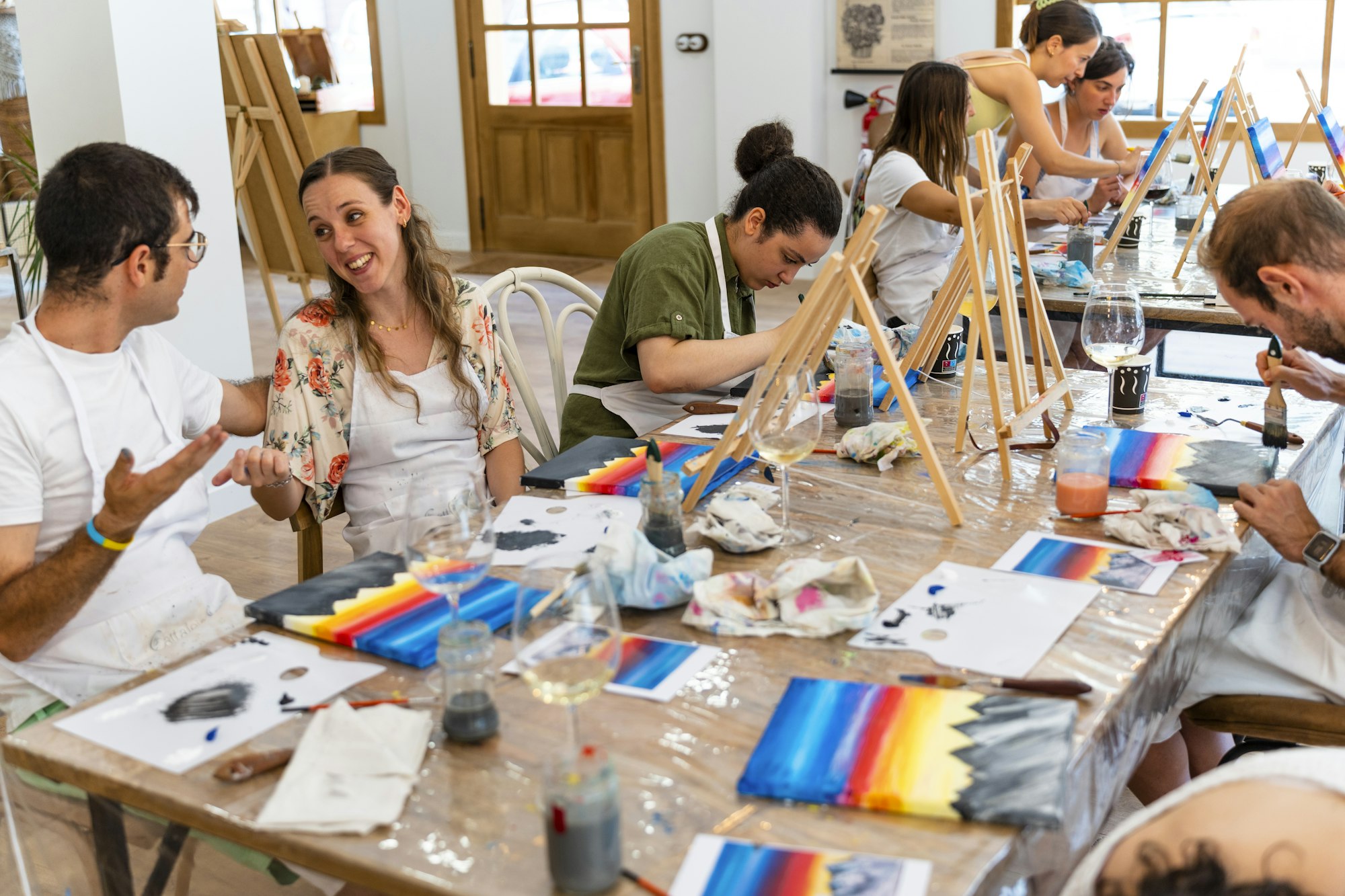 Painting Workshop. Friends having fun in painting class.